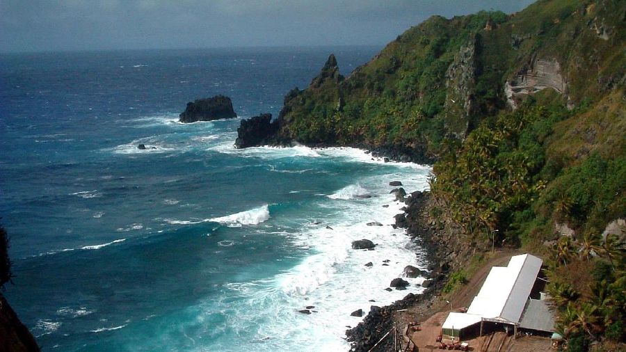 FILE - This June 13. 2003 file photo shows a small loading dock in Bounty Bay on Pitcairn Island. Pitcairn Island, a tiny speck in the Pacific thats home to just 48 people, has passed a law allowing same-sex marriage - but has no gay couples wanting to wed. Pitcairn Deputy Governor Kevin Lynch said Monday, June 22, 2015 the new law came into effect May 15. First settled in 1790, Pitcairn is a British Overseas Territory that has some legal autonomy and is often considered the worlds smallest country by population. Islanders are descended from the mutineers of the British navy vessel Bounty and their Tahitian companions. (AP Photo/File)
