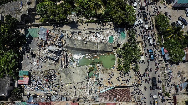 An aerial view of the Hotel Le Manguier destroyed by an earthquake, in Les Cayes, Haiti, Saturday, Aug. 14, 2021. A 7.2 magnitude earthquake struck Haiti on Saturday, with the epicenter about 125 kilometers (78 miles) west of the capital of Port -au-Prince, the US Geological Survey said. (AP Photo / Ralph Tedy Erol)
