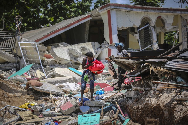 Gempa Haiti. (AP/Joseph Odelyn) Gempa Haiti. (AP/Joseph Odelyn)