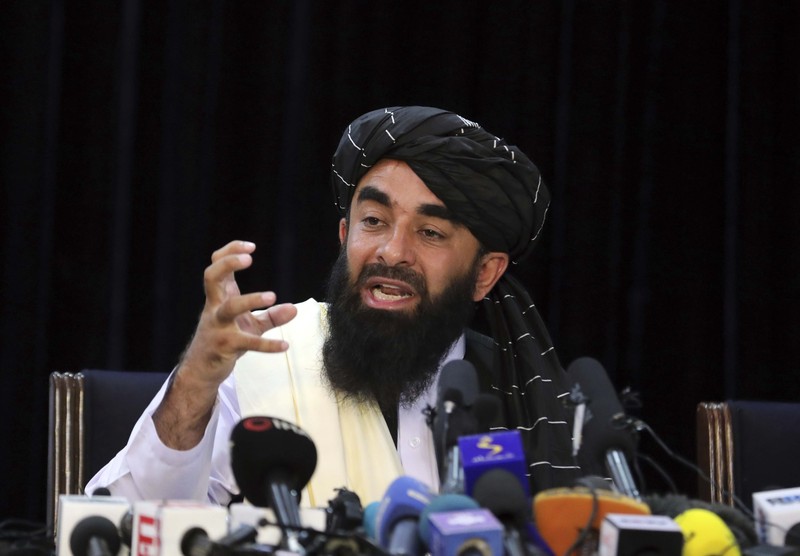 Juru bicara Taliban Zabihullah Mujahid berbicara pada konferensi pers pertamanya, di Kabul, Afghanistan, Selasa (17/8/2021). (AP/Rahmat Gul) TaJuru bicara Taliban Zabihullah Mujahid berbicara pada konferensi pers pertamanya, di Kabul, Afghanistan, Selasa (17/8/2021). (AP/Rahmat Gul)