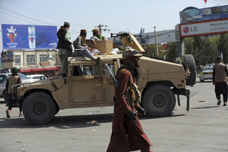 Taliban berpatroli di jalan Afghanistan. (AP/Rahmat Gul) Taliban berpatroli di jalan Afghanistan. (AP/Rahmat Gul)