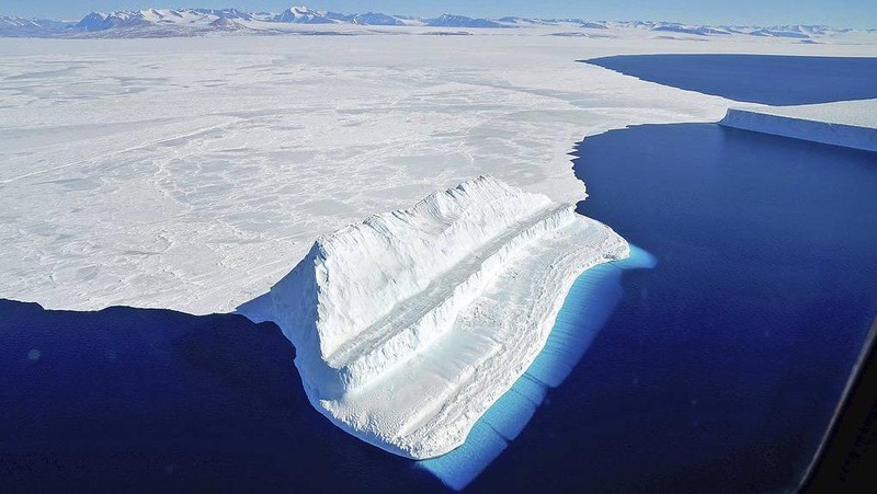 In this handout photo provided by British Antarctic Survey, field guide Andy Hood is seen at the Brunt ice shelf in Antarctica in January 2020. Antarctica remains the only continent without COVID-19 and now in Sept. 2020, as nearly 1,000 scientists and others who wintered over on the ice are seeing the sun for the first time in months, a global effort wants to make sure incoming colleagues don't bring the virus with them. (Robert Taylor/British Antarctic Survey via AP)