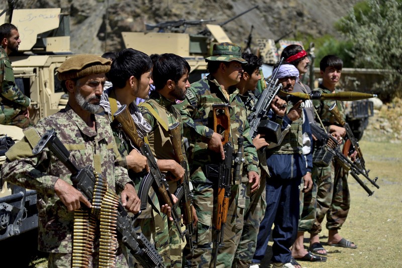 Afghanistan Militiamen loyal to Ahmad Massoud, son of the late Ahmad Shah Massoud, hold their weapons, in Panjshir province northeastern Afghanistan, Thursday, Aug. 26, 2021. The Panjshir Valley is the last region not under Taliban control following their stunning blitz across Afghanistan. Local fighters held off the Soviets in the 1980s and the Taliban a decade later under the leadership of Ahmad Shah Massoud, a guerrilla fighter who attained near-mythic status before he was killed in a suicide bombing. (AP Photo/Jalaluddin Sekandar)