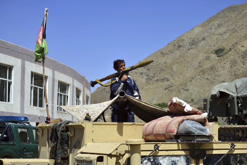 Afghanistan Militiamen loyal to Ahmad Massoud, son of the late Ahmad Shah Massoud, hold their weapons, in Panjshir province northeastern Afghanistan, Thursday, Aug. 26, 2021. The Panjshir Valley is the last region not under Taliban control following their stunning blitz across Afghanistan. Local fighters held off the Soviets in the 1980s and the Taliban a decade later under the leadership of Ahmad Shah Massoud, a guerrilla fighter who attained near-mythic status before he was killed in a suicide bombing. (AP Photo/Jalaluddin Sekandar)