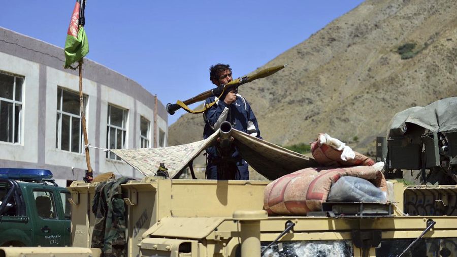 Militiamen loyal to Ahmad Massoud, son of the late Ahmad Shah Massoud, hold their weapons, in Panjshir province northeastern Afghanistan, Thursday, Aug. 26, 2021. The Panjshir Valley is the last region not under Taliban control following their stunning blitz across Afghanistan. Local fighters held off the Soviets in the 1980s and the Taliban a decade later under the leadership of Ahmad Shah Massoud, a guerrilla fighter who attained near-mythic status before he was killed in a suicide bombing. (AP Photo/Jalaluddin Sekandar)