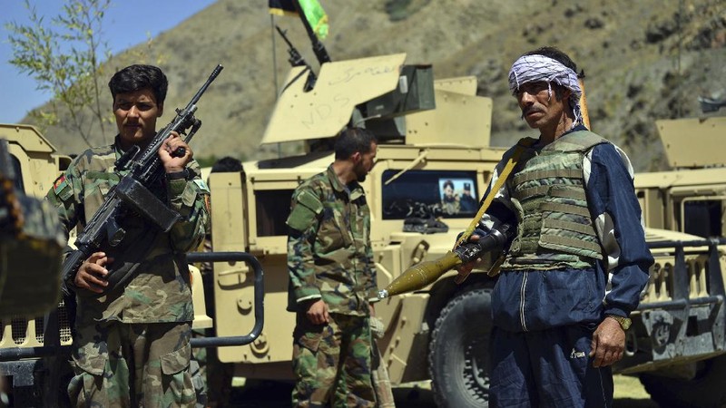 Militiamen loyal to Ahmad Massoud, son of the late Ahmad Shah Massoud, hold their weapons, in Panjshir province northeastern Afghanistan, Thursday, Aug. 26, 2021. The Panjshir Valley is the last region not under Taliban control following their stunning blitz across Afghanistan. Local fighters held off the Soviets in the 1980s and the Taliban a decade later under the leadership of Ahmad Shah Massoud, a guerrilla fighter who attained near-mythic status before he was killed in a suicide bombing. (AP Photo/Jalaluddin Sekandar)