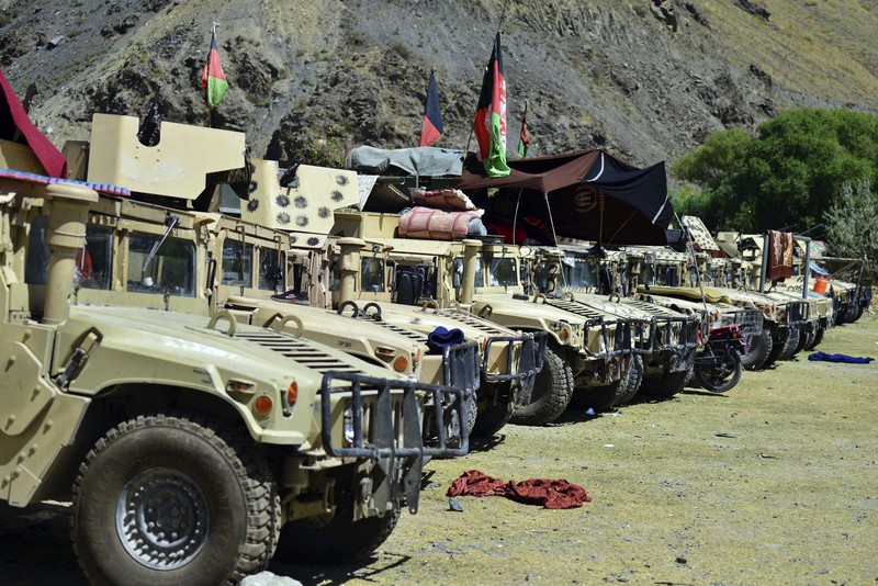 Afghanistan Militiamen loyal to Ahmad Massoud, son of the late Ahmad Shah Massoud, hold their weapons, in Panjshir province northeastern Afghanistan, Thursday, Aug. 26, 2021. The Panjshir Valley is the last region not under Taliban control following their stunning blitz across Afghanistan. Local fighters held off the Soviets in the 1980s and the Taliban a decade later under the leadership of Ahmad Shah Massoud, a guerrilla fighter who attained near-mythic status before he was killed in a suicide bombing. (AP Photo/Jalaluddin Sekandar)