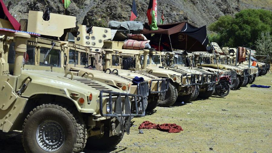 Militiamen loyal to Ahmad Massoud, son of the late Ahmad Shah Massoud, hold their weapons, in Panjshir province northeastern Afghanistan, Thursday, Aug. 26, 2021. The Panjshir Valley is the last region not under Taliban control following their stunning blitz across Afghanistan. Local fighters held off the Soviets in the 1980s and the Taliban a decade later under the leadership of Ahmad Shah Massoud, a guerrilla fighter who attained near-mythic status before he was killed in a suicide bombing. (AP Photo/Jalaluddin Sekandar)