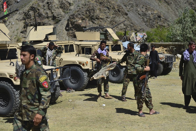 Afghanistan Militiamen loyal to Ahmad Massoud, son of the late Ahmad Shah Massoud, hold their weapons, in Panjshir province northeastern Afghanistan, Thursday, Aug. 26, 2021. The Panjshir Valley is the last region not under Taliban control following their stunning blitz across Afghanistan. Local fighters held off the Soviets in the 1980s and the Taliban a decade later under the leadership of Ahmad Shah Massoud, a guerrilla fighter who attained near-mythic status before he was killed in a suicide bombing. (AP Photo/Jalaluddin Sekandar)