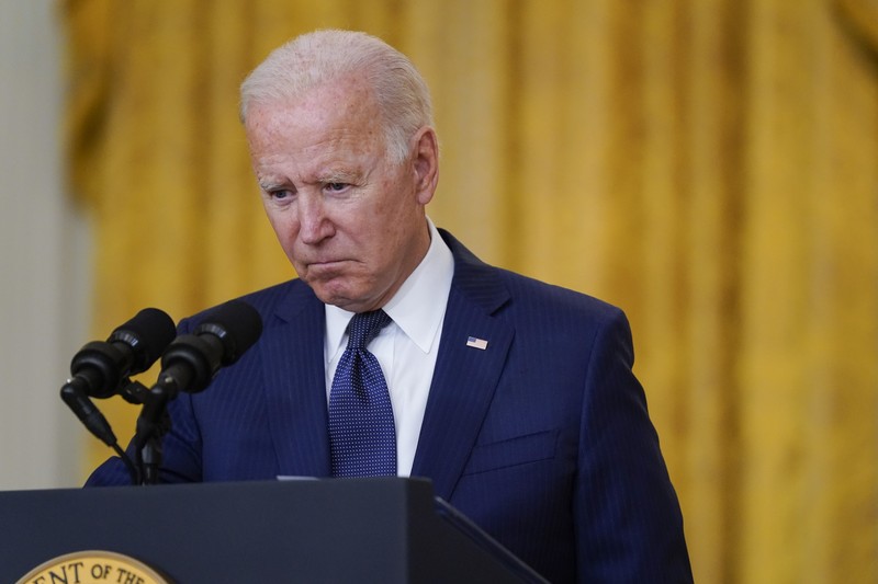 President Joe Biden speaks about the bombings at the Kabul airport that killed at least 12 U.S. service members, from the East Room of the White House, Thursday, Aug. 26, 2021, in Washington. (AP Photo/Evan Vucci)
