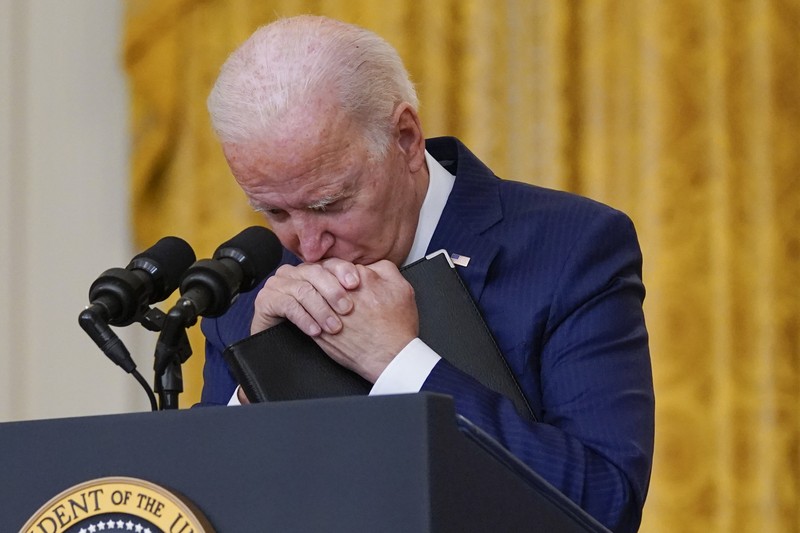 Biden President Joe Biden speaks about the bombings at the Kabul airport that killed at least 12 U.S. service members, from the East Room of the White House, Thursday, Aug. 26, 2021, in Washington. (AP Photo/Evan Vucci)