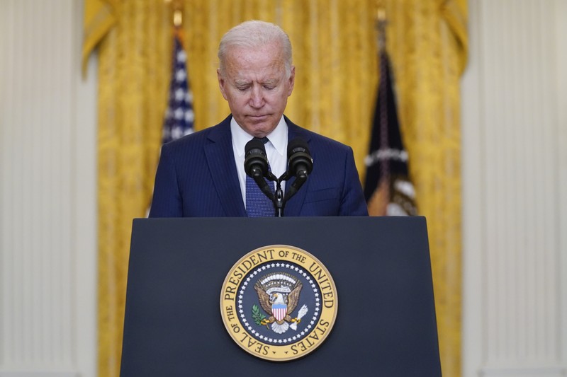 President Joe Biden speaks about the bombings at the Kabul airport that killed at least 12 U.S. service members, from the East Room of the White House, Thursday, Aug. 26, 2021, in Washington. (AP Photo/Evan Vucci)