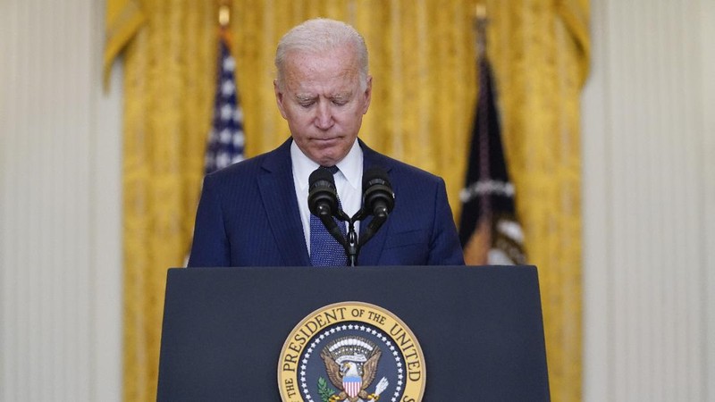 President Joe Biden speaks about the bombings at the Kabul airport that killed at least 12 U.S. service members, from the East Room of the White House, Thursday, Aug. 26, 2021, in Washington. (AP Photo/Evan Vucci)