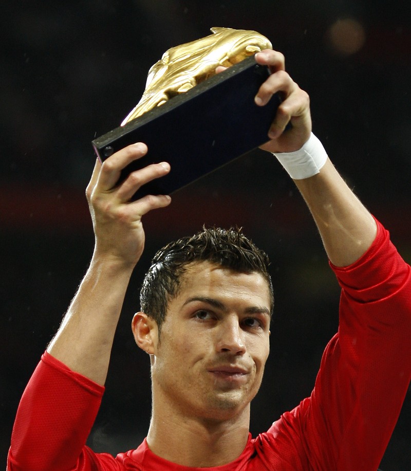 FILE - In this Aug. 12, 2006, file photo, Manchester United's Cristiano Ronaldo, right, celebrates scoring against Sevilla with Ole Gunnar Solskjaer and Patrice Evra during a soccer match in Manchester, England. Ronaldo is headed back to Manchester United. The English club said Friday, Aug. 27, 2021, it has reached an agreement with Juventus for the transfer of the 36-year-old Portugal forward, subject to agreement of personal terms, visa and a medical examination. (Martin Rickett/PA via AP)