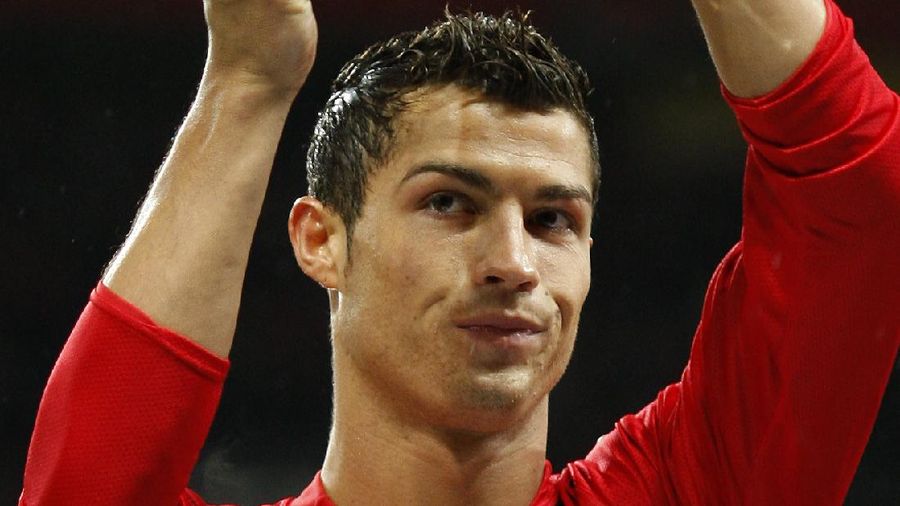 FILE - In this Aug. 12, 2006, file photo, Manchester United's Cristiano Ronaldo, right, celebrates scoring against Sevilla with Ole Gunnar Solskjaer and Patrice Evra during a soccer match in Manchester, England. Ronaldo is headed back to Manchester United. The English club said Friday, Aug. 27, 2021, it has reached an agreement with Juventus for the transfer of the 36-year-old Portugal forward, subject to agreement of personal terms, visa and a medical examination. (Martin Rickett/PA via AP)