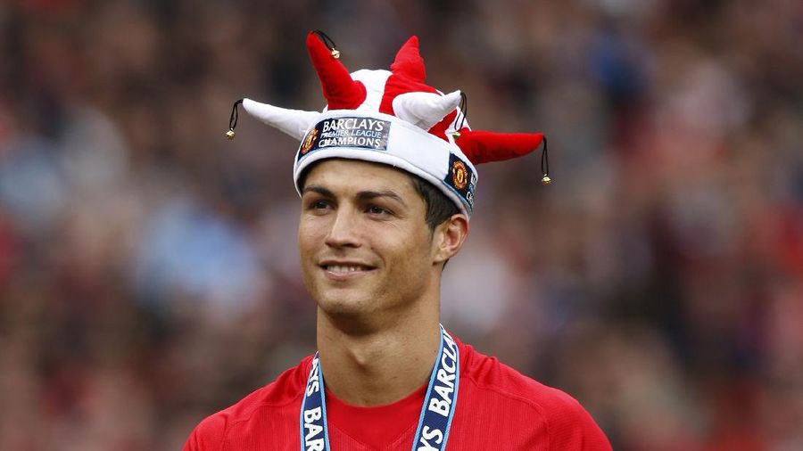 FILE - In this Aug. 12, 2006, file photo, Manchester United's Cristiano Ronaldo, right, celebrates scoring against Sevilla with Ole Gunnar Solskjaer and Patrice Evra during a soccer match in Manchester, England. Ronaldo is headed back to Manchester United. The English club said Friday, Aug. 27, 2021, it has reached an agreement with Juventus for the transfer of the 36-year-old Portugal forward, subject to agreement of personal terms, visa and a medical examination. (Martin Rickett/PA via AP)