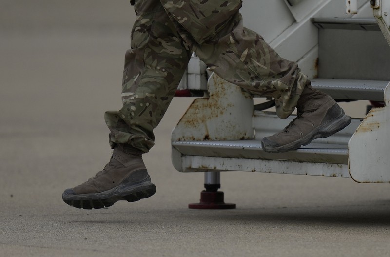 In this handout photo provided by the Ministry of Defence, UK military personnel onboard a A400M aircraft departing Kabul, Afghanistan, Saturday, Aug. 28, 2021. Britain has ended evacuation flights from Kabul airport and begun bringing U.K. troops home. Britain’s defense ministry said the final flight for Afghan citizens had left Kabul. Further flights over the weekend will bring home British troops and diplomats and a few remaining civilians. (Jonathan Gifford/Ministry of Defence via AP)