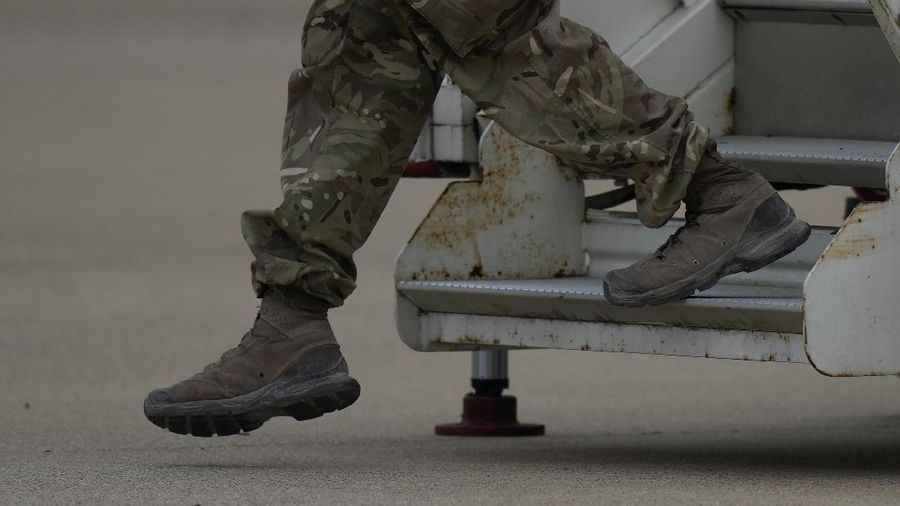 In this handout photo provided by the Ministry of Defence, UK military personnel onboard a A400M aircraft departing Kabul, Afghanistan, Saturday, Aug. 28, 2021. Britain has ended evacuation flights from Kabul airport and begun bringing U.K. troops home. Britain’s defense ministry said the final flight for Afghan citizens had left Kabul. Further flights over the weekend will bring home British troops and diplomats and a few remaining civilians. (Jonathan Gifford/Ministry of Defence via AP)