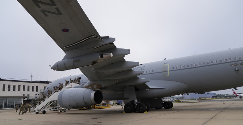 In this handout photo provided by the Ministry of Defence, UK military personnel onboard a A400M aircraft departing Kabul, Afghanistan, Saturday, Aug. 28, 2021. Britain has ended evacuation flights from Kabul airport and begun bringing U.K. troops home. Britain’s defense ministry said the final flight for Afghan citizens had left Kabul. Further flights over the weekend will bring home British troops and diplomats and a few remaining civilians. (Jonathan Gifford/Ministry of Defence via AP)