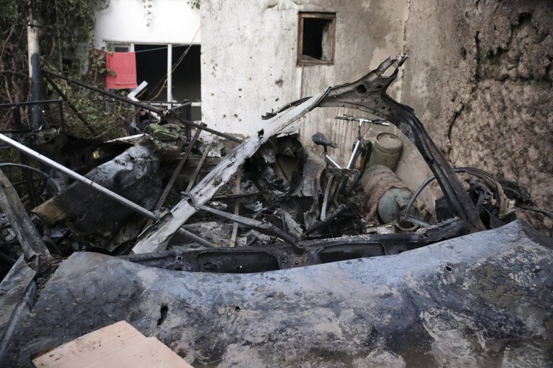 A destroyed vehicle is seen inside a house after a U.S. drone strike in Kabul, Afghanistan, Sunday, Aug. 29, 2021. A U.S. drone strike destroyed a vehicle carrying 