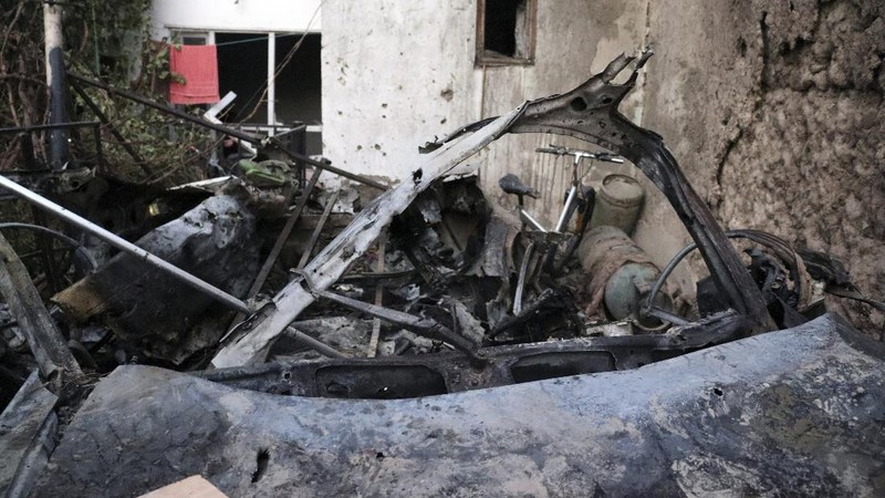 A destroyed vehicle is seen inside a house after a U.S. drone strike in Kabul, Afghanistan, Sunday, Aug. 29, 2021. A U.S. drone strike destroyed a vehicle carrying 