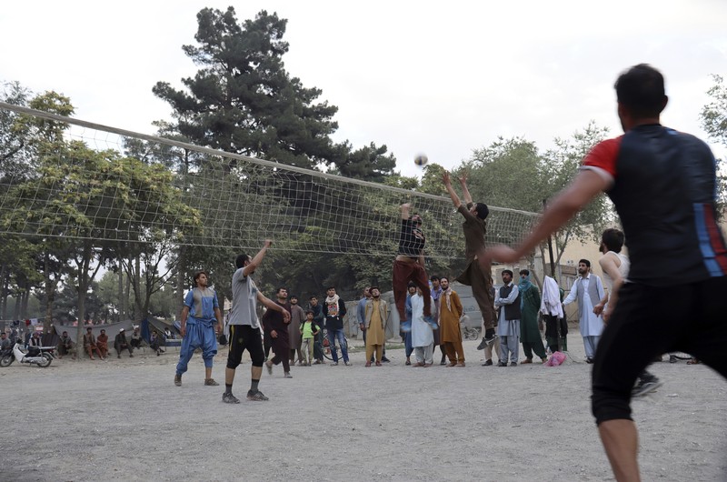 Taliban fighters hold Taliban flags in Kabul, Afghanistan, Monday, Aug. 30, 2021. Many Afghans are anxious about the Taliban rule and are figuring out ways to get out of Afghanistan. But it's the financial desperation that seems to hang heavy over the city. (AP Photo/Khwaja Tawfiq Sediqi)
