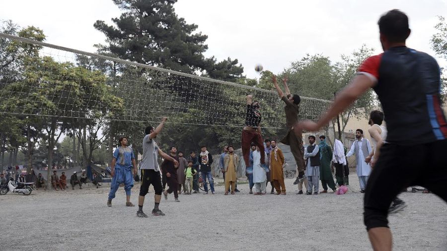 Taliban fighters hold Taliban flags in Kabul, Afghanistan, Monday, Aug. 30, 2021. Many Afghans are anxious about the Taliban rule and are figuring out ways to get out of Afghanistan. But it's the financial desperation that seems to hang heavy over the city. (AP Photo/Khwaja Tawfiq Sediqi)
