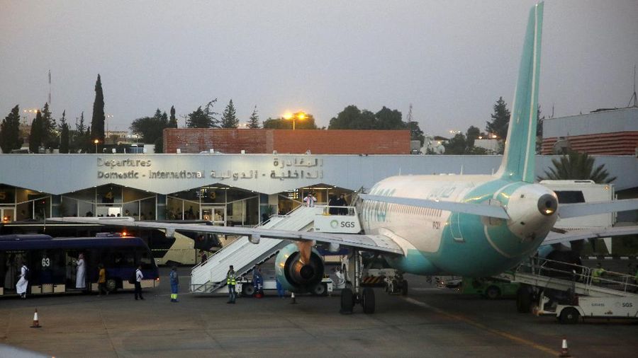 In this Thursday, Aug. 22, 2019, photo, passengers leave the arrival terminal of Abha airport, south of Saudi. Saudi Arabia said early Thursday, Aug. 29, 2019, that a Houthi strike hit Abha regional airport, causing no injuries. Saudi Arabia said early Thursday that a Houthi strike hit Abha regional airport, causing no injuries. The Houthis said they attacked the facility with a Quds-1 cruise missile late Wednesday. Attacks targeting that airport over recent weeks have wounded dozens. (AP Photo/Amr Nabil)