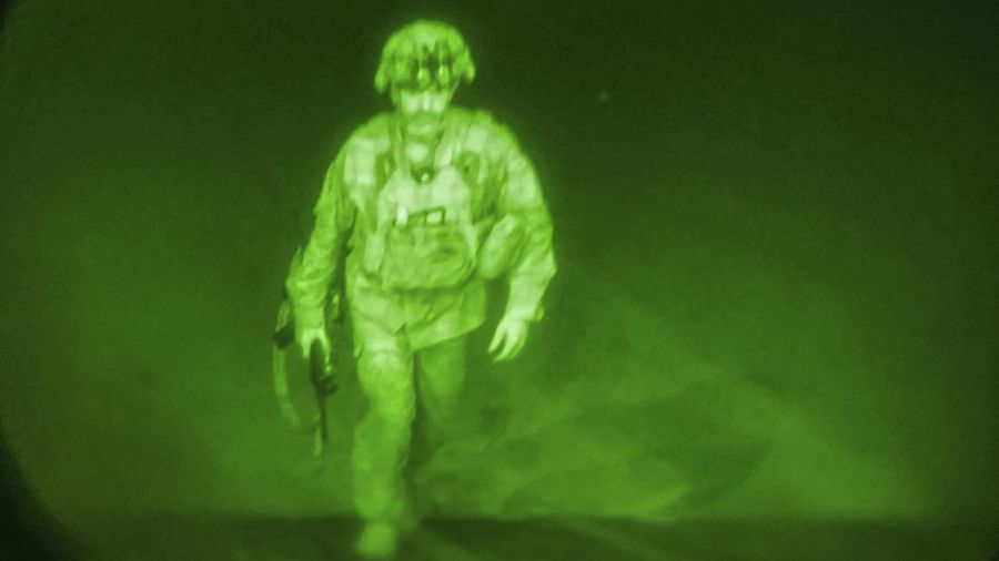 In this Aug. 30, 2021, photo provided by the U.S. Air Force, soldiers, assigned to the 82nd Airborne Division, prepare to board a U.S. Air Force C-17 Globemaster III aircraft at Hamid Karzai International Airport in Kabul, Afghanistan. (Senior Airman Taylor Crul/U.S. Air Force via AP)