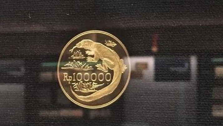 Uang logam emas Rp100 ribu bergambar komodo. (Arsip BI via Detikcom).