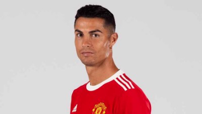 Cristiano Ronaldo mengenakan kostum Manchester United Cristiano Ronaldo mengenakan kostum Manchester United. (Dok. Manchester United)