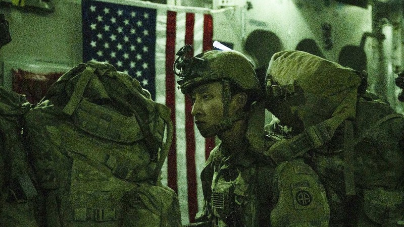 In this Aug. 30, 2021, photo provided by the U.S. Air Force, soldiers, assigned to the 82nd Airborne Division, prepare to board a U.S. Air Force C-17 Globemaster III aircraft at Hamid Karzai International Airport in Kabul, Afghanistan. (Senior Airman Taylor Crul/U.S. Air Force via AP)