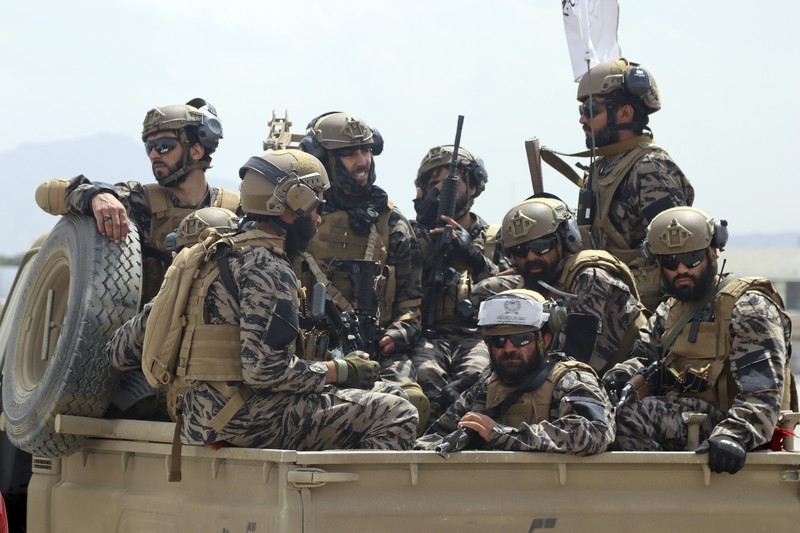 Taliban special forces fighters stand guard outside the Hamid Karzai International Airport after the U.S. military's withdrawal, in Kabul, Afghanistan, Tuesday, Aug. 31, 2021. The Taliban were in full control of Kabul's airport on Tuesday, after the last U.S. plane left its runway, marking the end of America's longest war. (AP Photo/Khwaja Tawfiq Sediqi)