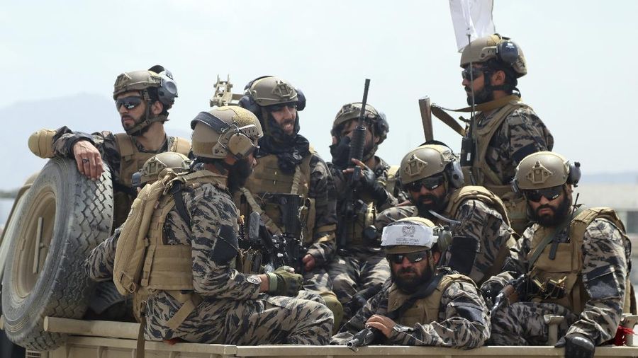 Taliban special forces fighters arrive inside the Hamid Karzai International Airport after the U.S. military's withdrawal, in Kabul, Afghanistan, Tuesday, Aug. 31, 2021. The Taliban were in full control of Kabul's airport on Tuesday, after the last U.S. plane left its runway, marking the end of America's longest war. (AP Photo/Khwaja Tawfiq Sediqi)