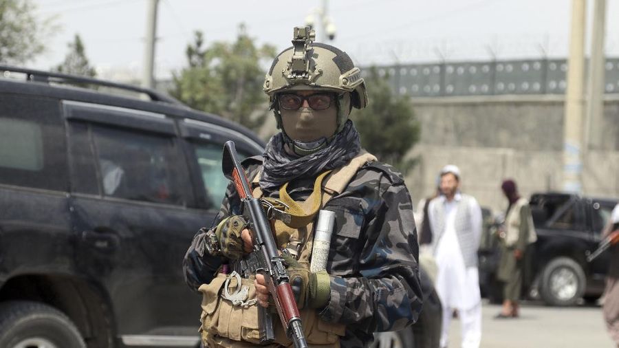Taliban special forces fighters stand guard outside the Hamid Karzai International Airport after the U.S. military's withdrawal, in Kabul, Afghanistan, Tuesday, Aug. 31, 2021. The Taliban were in full control of Kabul's airport on Tuesday, after the last U.S. plane left its runway, marking the end of America's longest war. (AP Photo/Khwaja Tawfiq Sediqi)