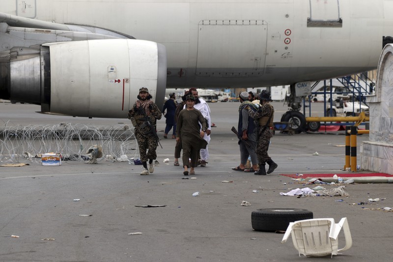 Taliban special forces fighters stand guard outside the Hamid Karzai International Airport after the U.S. military's withdrawal, in Kabul, Afghanistan, Tuesday, Aug. 31, 2021. The Taliban were in full control of Kabul's airport on Tuesday, after the last U.S. plane left its runway, marking the end of America's longest war. (AP Photo/Khwaja Tawfiq Sediqi)