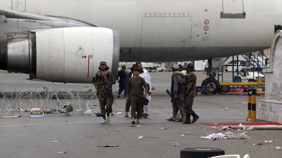 Taliban special forces fighters stand guard outside the Hamid Karzai International Airport after the U.S. military's withdrawal, in Kabul, Afghanistan, Tuesday, Aug. 31, 2021. The Taliban were in full control of Kabul's airport on Tuesday, after the last U.S. plane left its runway, marking the end of America's longest war. (AP Photo/Khwaja Tawfiq Sediqi)