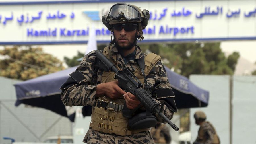 Taliban special force fighters stand guard outside the Hamid Karzai International Airport after the U.S. military's withdrawal, in Kabul, Afghanistan, Tuesday, Aug. 31, 2021. The Taliban were in full control of Kabul's airport on Tuesday, after the last U.S. plane left its runway, marking the end of America's longest war. (AP Photo/Khwaja Tawfiq Sediqi)