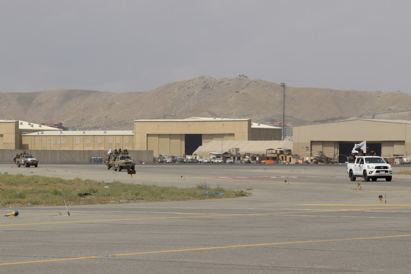 Taliban special forces fighters stand guard outside the Hamid Karzai International Airport after the U.S. military's withdrawal, in Kabul, Afghanistan, Tuesday, Aug. 31, 2021. The Taliban were in full control of Kabul's airport on Tuesday, after the last U.S. plane left its runway, marking the end of America's longest war. (AP Photo/Khwaja Tawfiq Sediqi)