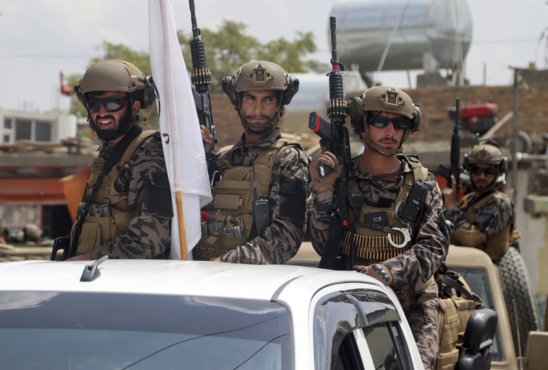 Taliban special forces fighters stand guard outside the Hamid Karzai International Airport after the U.S. military's withdrawal, in Kabul, Afghanistan, Tuesday, Aug. 31, 2021. The Taliban were in full control of Kabul's airport on Tuesday, after the last U.S. plane left its runway, marking the end of America's longest war. (AP Photo/Khwaja Tawfiq Sediqi)