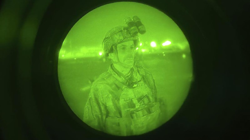 In this Aug. 30, 2021, photo provided by the U.S. Air Force, soldiers, assigned to the 82nd Airborne Division, prepare to board a U.S. Air Force C-17 Globemaster III aircraft at Hamid Karzai International Airport in Kabul, Afghanistan. (Senior Airman Taylor Crul/U.S. Air Force via AP)