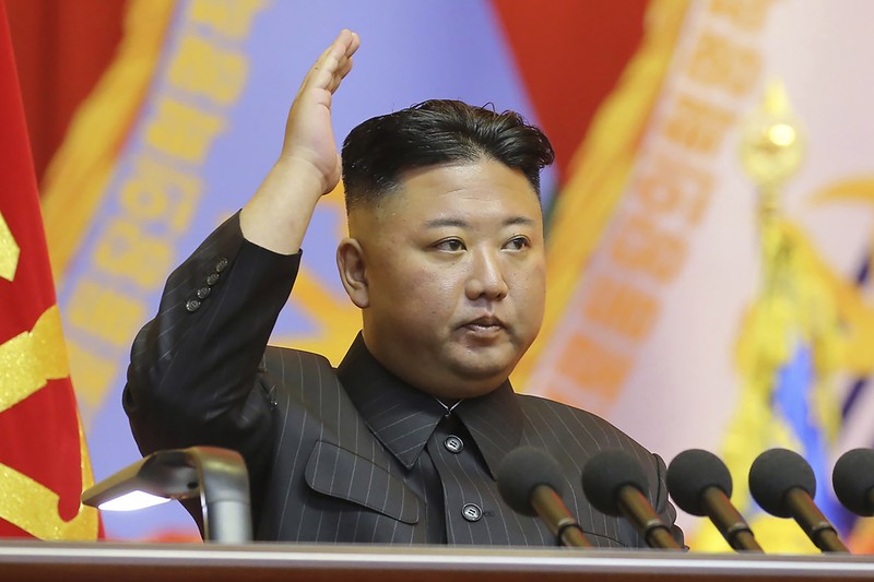 In this undated photo provided by the North Korean government on Tuesday, Aug. 31, 2021, North Korean leader Kim Jong Un, center, meets the participants in Youth Day celebrations during a photo session at an undisclosed place in North Korea. Independent journalists were not given access to cover the event depicted in this image distributed by the North Korean government. The content of this image is as provided and cannot be independently verified. Korean language watermark on image as provided by source reads: 
