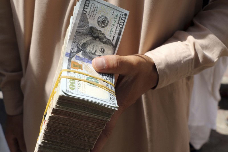 Pasar pertukaran uang utama di Kabul, ibu kota Afghanistan dibuka kembali pada Sabtu (4/9/2021). (AP/Wali Sabawoon) Pasar pertukaran uang utama di Kabul, ibu kota Afghanistan dibuka kembali pada Sabtu (4/9/2021). (AP/Wali Sabawoon)