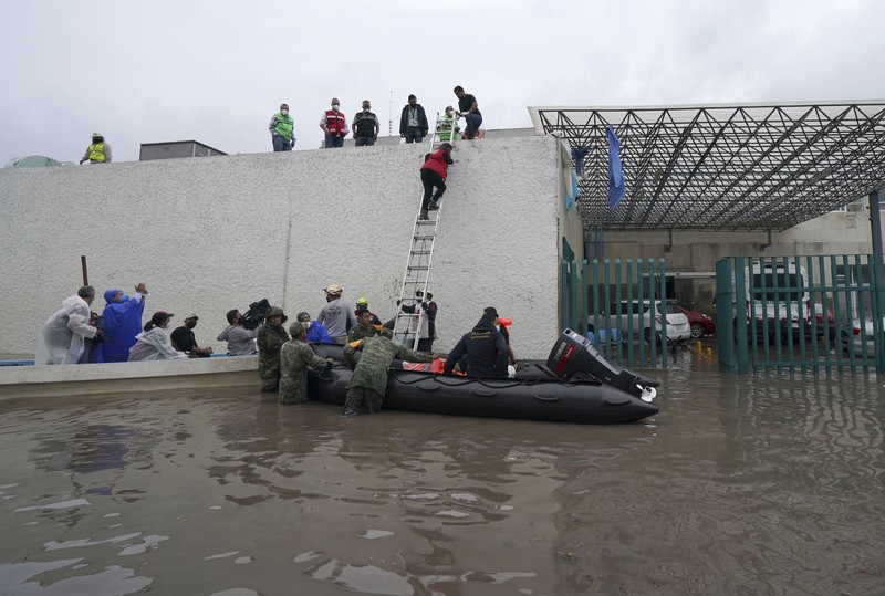 Sebuah rumah sakit di kota Tula, Hidalgo, Meksiko, terendam banjir akibat hujan deras. (AP/Marco Ugarte) Sebuah rumah sakit di kota Tula, Hidalgo, Meksiko, terendam banjir akibat hujan deras. (AP/Marco Ugarte)