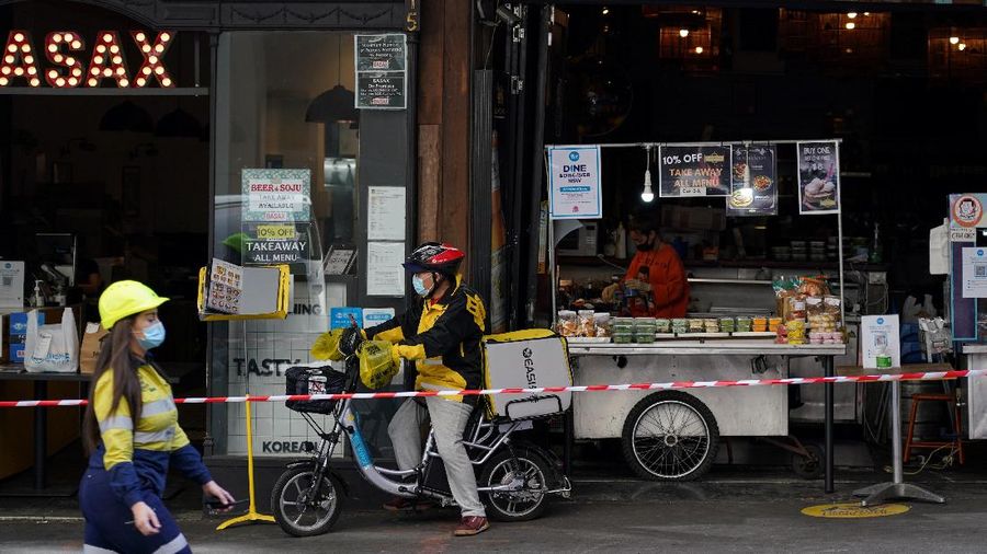 Covid-19 Australia rekor tertinggi sepanjang pandemi. (REUTERS/LOREN ELLIOTT)