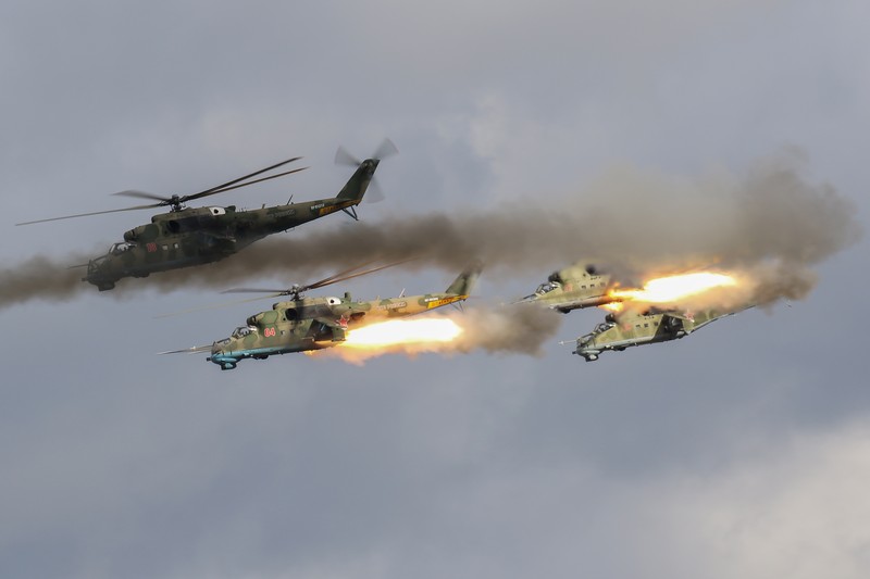 RUSSIA-BELARUS/MILITARY DRILLS Russian MI-24 attack helicopters fire rockets during the active phase of the military exercises