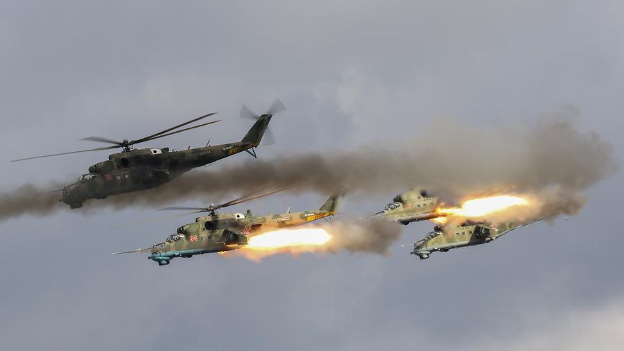 Russian MI-24 attack helicopters fire rockets during the active phase of the military exercises 