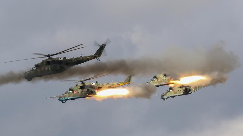 Russian MI-24 attack helicopters fire rockets during the active phase of the military exercises 