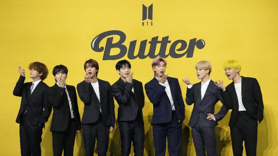 FILE - In this May 21, 2021, file photo members of South Korean K-pop band BTS pose for photographers ahead of a press conference to introduce their new single