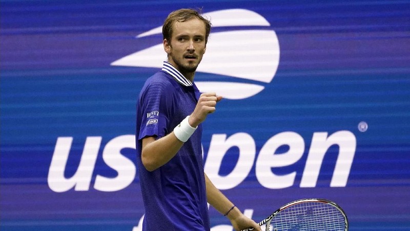 Daniil Medvedev, of Russia, kisses the championship trophy after defeating Novak Djokovic, of Serbia, during the men's singles final of the US Open tennis championships, Sunday, Sept. 12, 2021, in New York. (AP Photo/Seth Wenig)